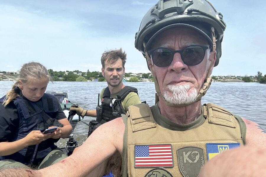 On the boat in Kherson flood, K9 International Rescue volunteers (left to right), Freja Mille Que from Denmark, Yannick Bogge from Germany and Tom Bates from Lakebay.